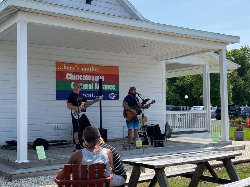 band playing at the farmers market