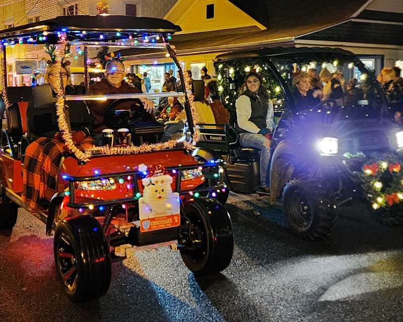 Christmas Parade in Chincoteague side by side